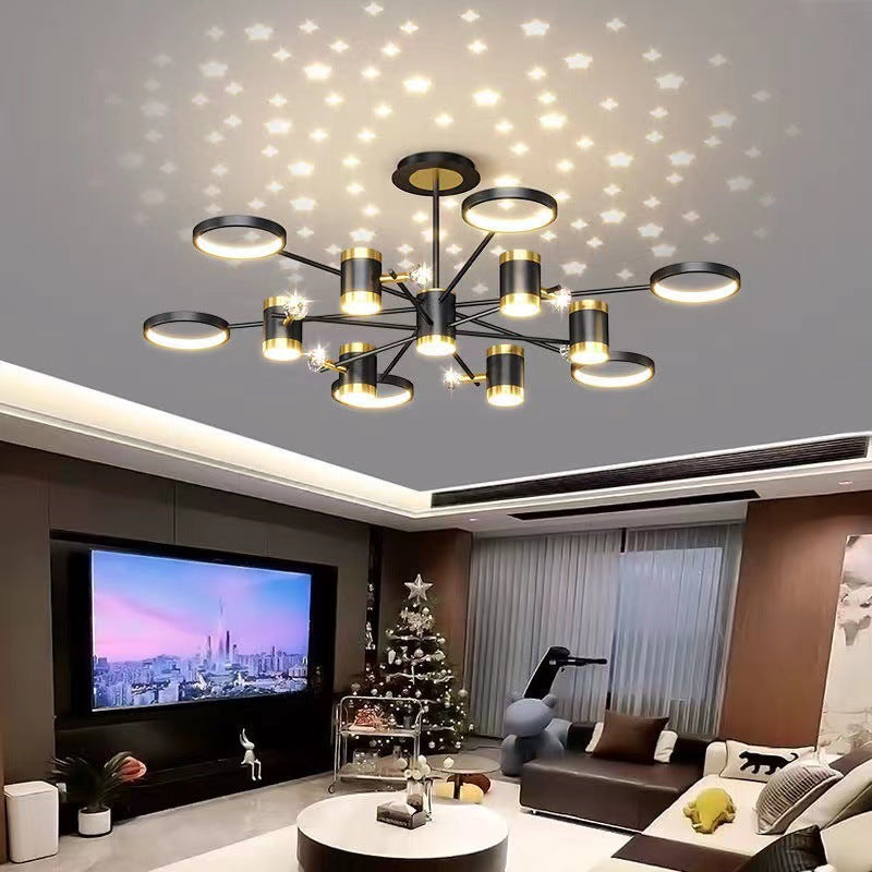 Light Luxury Chandelier Nordic Star Lamp Combination illuminating a modern living room with star-shaped light patterns.